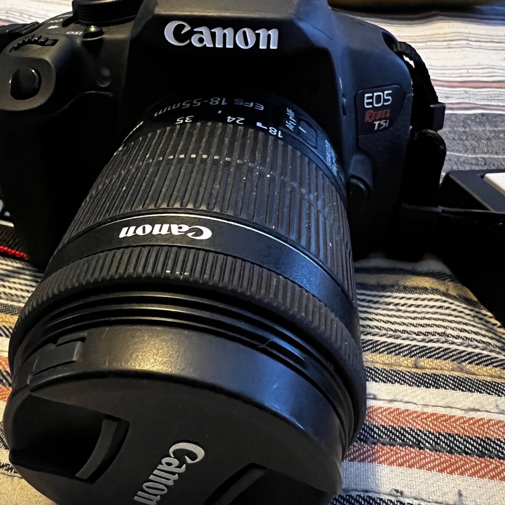 This camera with a lens and battery are 💯 in good condition it was used once